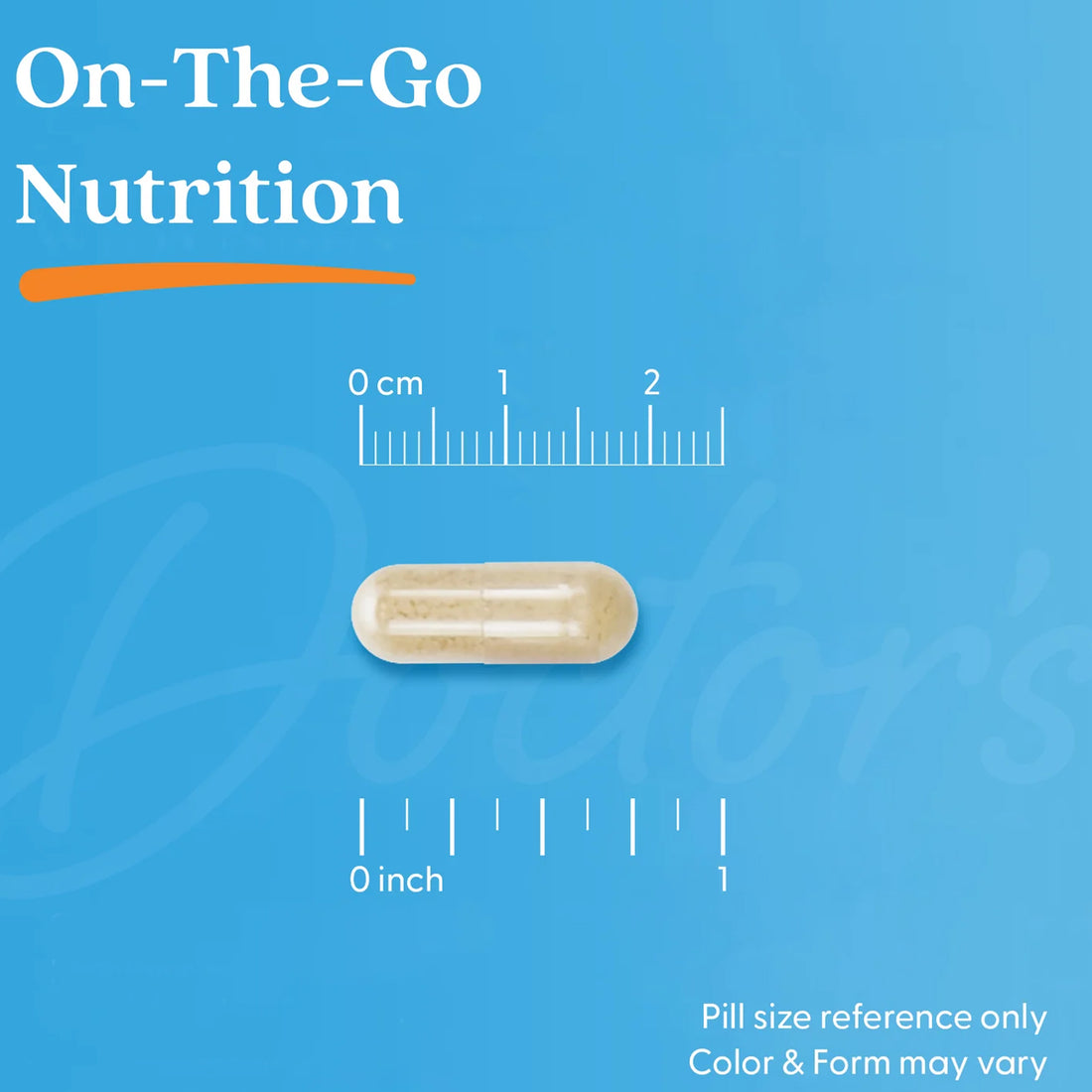 A beige translucent capsule pill centered on a bright blue background with measurement rulers in centimeters and inches for size reference. Large text reads &