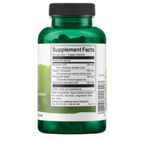 Green supplement bottle with label on a white background
