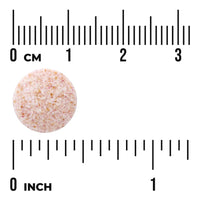 Single Swanson Oral Probiotic Formula chewable tablet shown against centimetre and inch scales